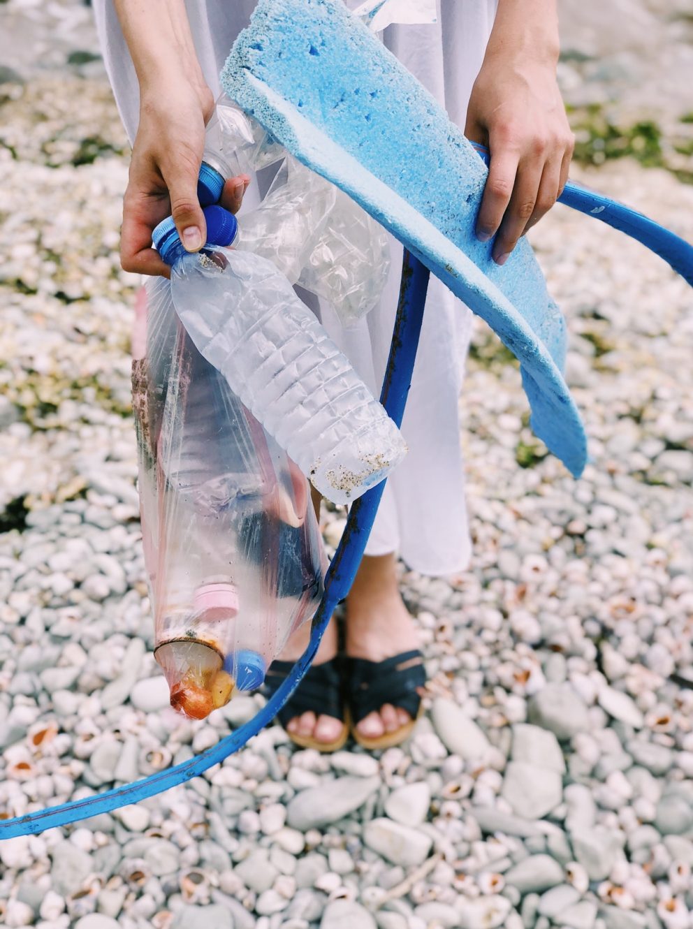 Image of woman holding recycling